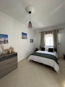 Postel nebo postele na pokoji v ubytování Appartement Haut Standing front de mer Malabata