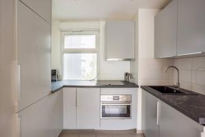 Køkken eller tekøkken på large appartment 2 parking spaces 5mn paris