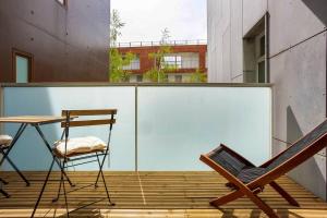 En balkon eller terrasse på large appartment 2 parking spaces 5mn paris