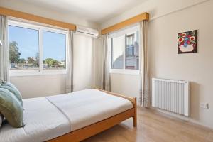 Postel nebo postele na pokoji v ubytování Spacious City Centre Living