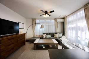 Ένα ή περισσότερα κρεβάτια σε δωμάτιο στο Casa YONNA Chatan