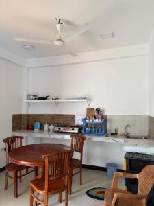 Kuchyň nebo kuchyňský kout v ubytování Gold Moon Guest House + 30 fotografií