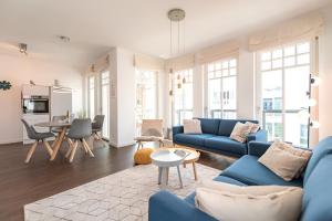 TV a/nebo společenská místnost v ubytování Quartier Schneespecht Westendpalais