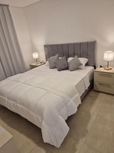 Ένα ή περισσότερα κρεβάτια σε δωμάτιο στο Feel 2 habitaciones