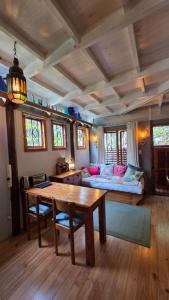 Ένα ή περισσότερα κρεβάτια σε δωμάτιο στο Noordhoek Beach Cabin