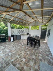 Patio nebo venkovní prostory v ubytování R&N tropical