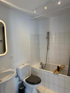 Koupelna v ubytování Le K Home du kaligone