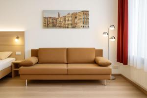 Posezení v ubytování Das Falk Apartmenthaus