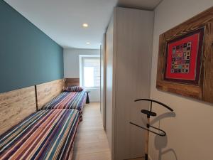 Ένα ή περισσότερα κρεβάτια σε δωμάτιο στο RosAlpina