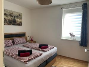 Postel nebo postele na pokoji v ubytování Albarosa Appartemant