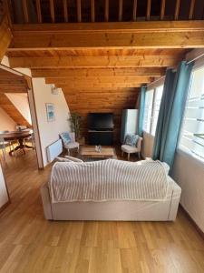 Ένα ή περισσότερα κρεβάτια σε δωμάτιο στο Parenthèse marine - Le Portel