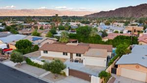 an aerial view of a small town with buildings at Desert Paradise Retreat - Pool Hot Tub & Fire Pit in La Quinta +44 photos