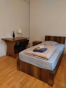 Ένα ή περισσότερα κρεβάτια σε δωμάτιο στο Hotel Okriba