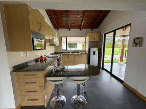 Kuchyň nebo kuchyňský kout v ubytování Quinta María Mercedes