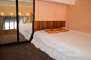 Ένα ή περισσότερα κρεβάτια σε δωμάτιο στο Lermontova 3 к 2