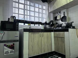 Una cocina o cocineta en Sumeya Homes Nanyuki