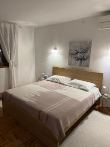 Ένα ή περισσότερα κρεβάτια σε δωμάτιο στο Villa Niceta