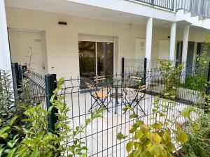 En balkon eller terrasse på Appartement Cosy Bord de Lac