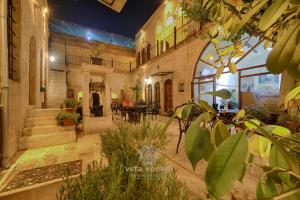 En have udenfor Vefa Konagı