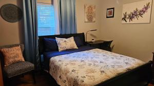 Ένα ή περισσότερα κρεβάτια σε δωμάτιο στο Charlotte's House