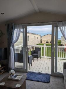 En balkon eller terrasse på Seagulls Nest, Sandy Bay