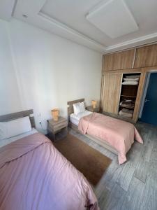 索维拉Bella casa的两张床位 - 带两张西德西德床