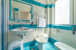 Ένα μπάνιο στο Hotel Calanca