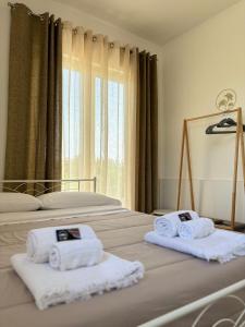 Una cama o camas en una habitación de La collina dei venti