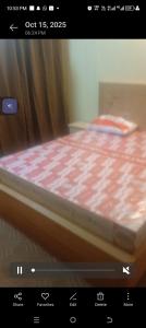 Ένα ή περισσότερα κρεβάτια σε δωμάτιο στο AlRehman 2st