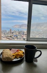 イキケにあるAltusの朝食用の食品、コーヒー