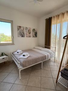 Una cama o camas en una habitación de La collina dei venti