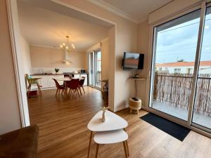 TV a/nebo společenská místnost v ubytování Calypso 3 Étoiles