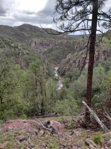 a view of a canyon with a river in the distance at Tello de luks in Chihuahua