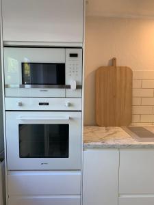 Η κουζίνα ή μικρή κουζίνα στο Charmantes Reihenhaus am Alsterlauf