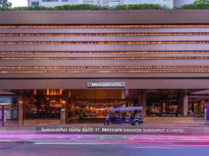 a building with a truck parked in front of it at Mercure Bangkok Sukhumvit 11 in Bangkok +95 photos
