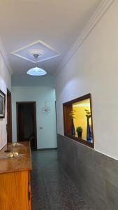 a room with a sink and a mirror on the wall at Casa Tranquila in Ingenio +11 photos