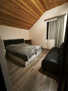 Postel nebo postele na pokoji v ubytování Тun Haus