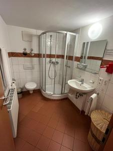 Koupelna v ubytování Hotel Iris