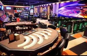 a poker room with a table and chairs and a casino at REPOS 150m plage Coeur de Berck in Berck-Plage +19 photos