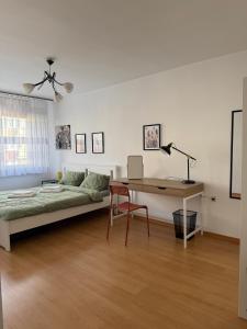 Postel nebo postele na pokoji v ubytování Apartament Słoneczny