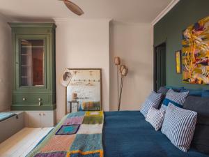 Ένα ή περισσότερα κρεβάτια σε δωμάτιο στο A la maison en medoc