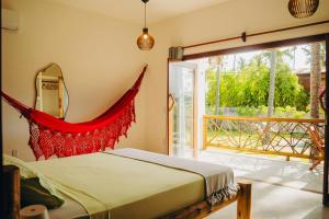 Ένα ή περισσότερα κρεβάτια σε δωμάτιο στο Casa de Coco Icarai +38 φωτογραφίες