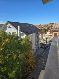 a view from the balcony of a building at Apartman Laki 56 in Kalugjerica