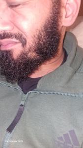 a man with a beard wearing a sweatshirt at Three Sixty in Manchester