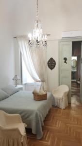 Postel nebo postele na pokoji v ubytování L'Atelier