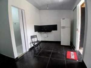 Kuchyň nebo kuchyňský kout v ubytování Kitnet aconchegante em cabo frio