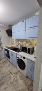 Η κουζίνα ή μικρή κουζίνα στο Safta Apartaments Center