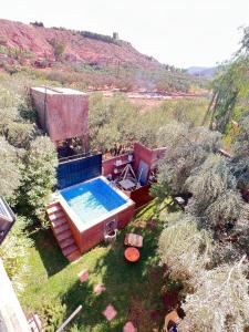 an overhead view of a swimming pool in a yard at Dar Ben Idar Atlas Mountains in Tahannout