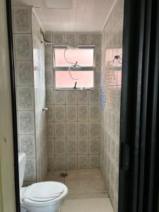 Bilik mandi di Apartamento para temporada