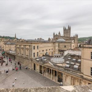 a large building with people walking in front of it at The Loft at 2 Bath Street in Bath